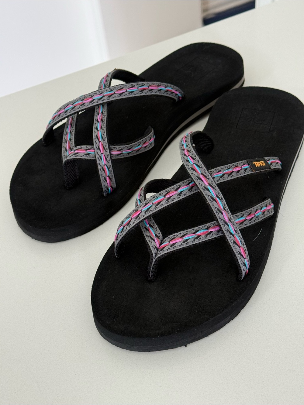 Teva Black Suede Crisscross Sandals with Pink & Blue Braided Straps